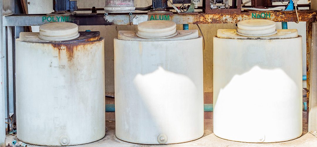 Three chemical feed tanks for alum, polymer and caustic, chemicals required when using traditional metal salts for removing phosphorus in wastewater.